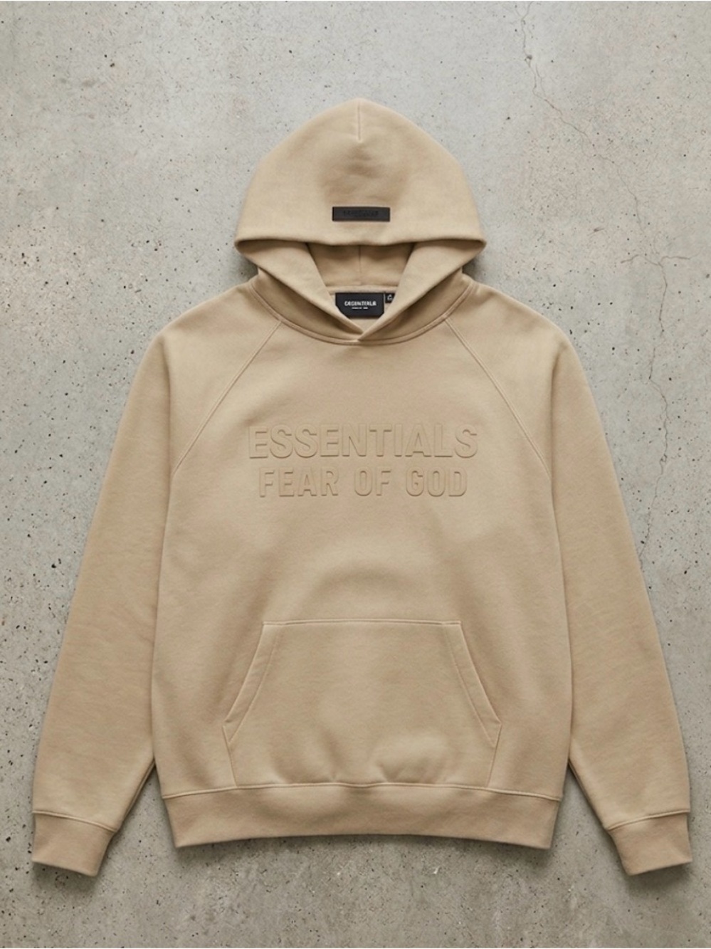 Fear of God Essentials Embossed Hoodie in sand color